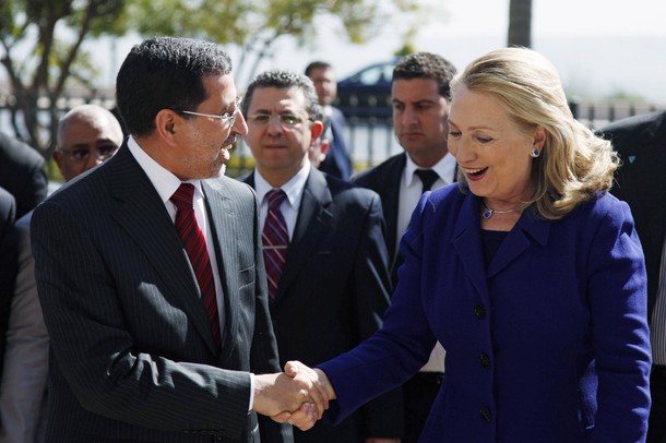 U.S. Secretary of State Hillary Clinton shakes hands with Morocco's Foreign Minister Saad Eddine Othmani in Rabat