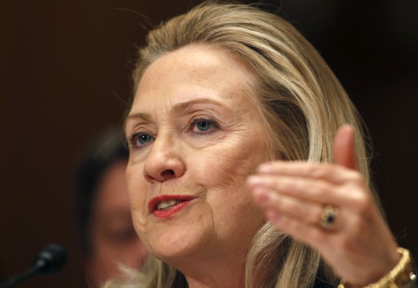 U.S. Secretary of State Hillary Clinton gestures while testifying on Capitol Hill in Washington