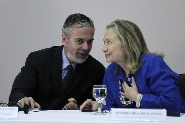 Brazil's Foreign Minister Antonio Patriota talks with U.S. Secretary of State Hillary Clinton during the annual conference "Open Government Partnership" in Brasilia