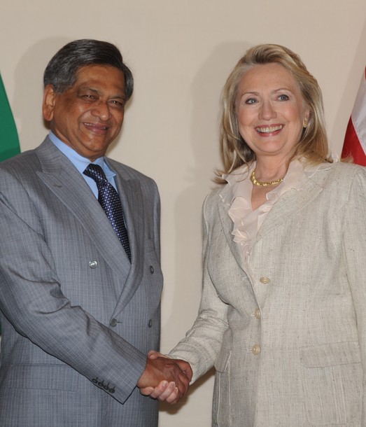 U.S. Secretary of State Hillary Clinton (R) shakes hands with India's Minister of External Affairs S.M.  Krishna before a news conference in New Delhi on May 8, 2012. Clinton has been pressing India to buy less from Iran as a way to pressure the Islamic regime over its contested nuclear programme. US Secretary of State Hillary Clinton wraps up a tour of Asia dominated by thorny disputes, as she sees signs of progress in working through problems with emerging powers China and India. AFP PHOTO/RAVEENDRAN        (Photo credit should read RAVEENDRAN/AFP/GettyImages)