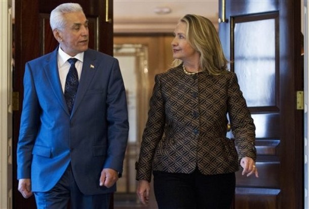 Secretary of State Hillary Rodham Clinton meets with Tajikistan's Foreign Minister Hamrokhon Zarifi at the State Department in Washington, Wednesday, May 16, 2012. (AP Photo/Jacquelyn Martin)