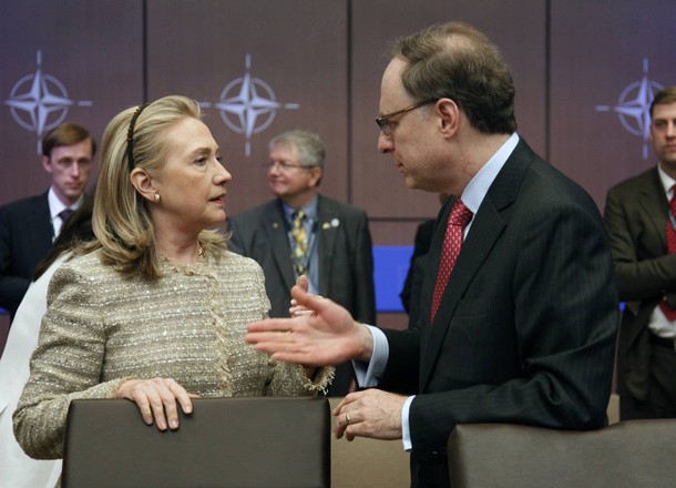 U.S. Secretary of State Hillary Clinton (L) talks to NATO Deputy Secretary General Alexander Vershbow before a Foreign Ministers meeting with Bosnia-Herzegovina, Georgia, Montenegro and Macedonia at the NATO Summit in Chicago, May 21, 2012. REUTERS/Jeff Haynes (UNITED STATES - Tags: POLITICS MILITARY)