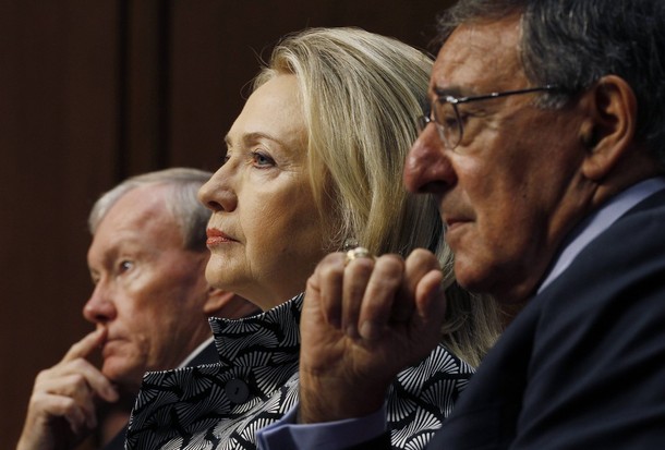 U.S. Secretary of State Hillary Clinton (C), U.S. Secretary of Defense Leon Panetta (R), and the Chairman of the Joint Chiefs of Staff, U.S. Army General Martin Dempsey (L) wait to testify at the Senate Foreign Relations Committee in Washington May 23, 2012. REUTERS/Gary Cameron (UNITED STATES - Tags: POLITICS MILITARY)