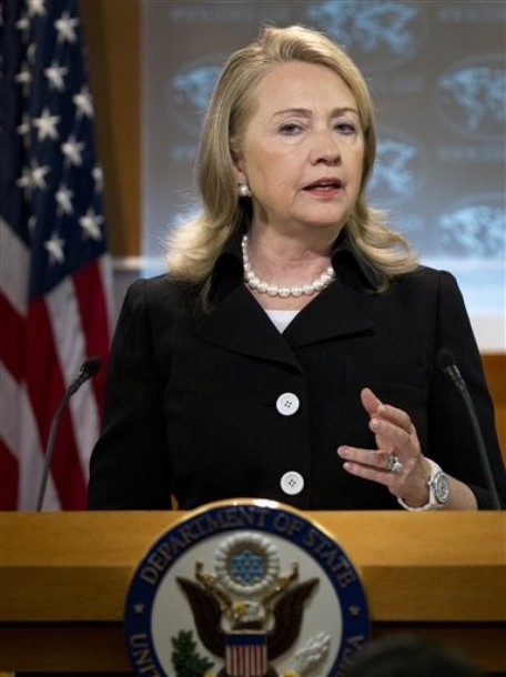 Secretary of State Hillary Rodham Clinton gestures during a news conference at the State Department in Washington, Thursday, May 24, 2012, to discuss the State Department's annual report on human rights.   (AP Photo/Manuel Balce Ceneta)