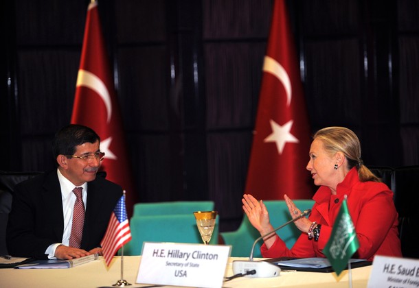 US Secretary of State Hillary Clinton(R) speaks with Turkish Foreign Minister Ahmet Davutoglu before their meeting on discuss the situation in Syria, a Turkish diplomatic source said, on June 6, 2012, in Istanbul. AFP PHOTO/BULENT KILIC        (Photo credit should read BULENT KILIC/AFP/GettyImages)