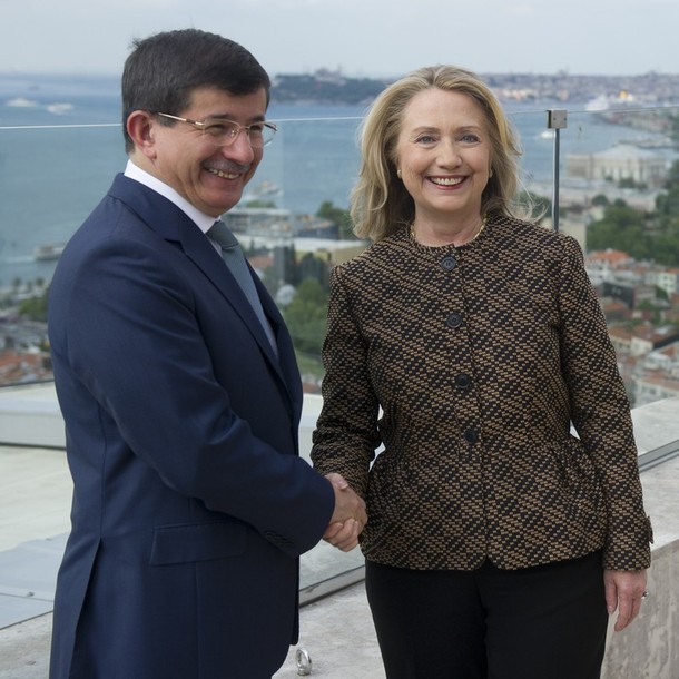 Turkish Foreign Minister Ahmet Davutoglu shakes hands with US Secretary of State Hillary Clinton before taking part in meetings in Istanbul on June 7, 2012.  AFP PHOTO / POOL / Saul LOEB        (Photo credit should read SAUL LOEB/AFP/GettyImages)