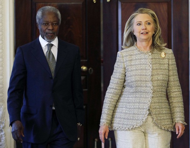 United States Secretary of State Hillary Clinton and Arab League Joint Special Envoy for Syria Kofi Annan walk to the podium  in Washington
