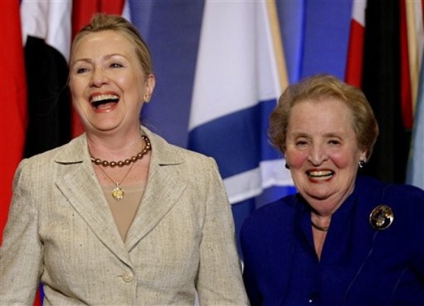 Secretary of State Hillary Rodham Clinton, left, and former Secretary of State Madeleine Albright respond to applause as Clinton is introduced to a gathering of the Women in Public Service Institute at Wellesley College in Wellesley, Mass., Monday, June 11, 2012. Both women are graduates of Wellesely. (AP Photo/Stephan Savoia)