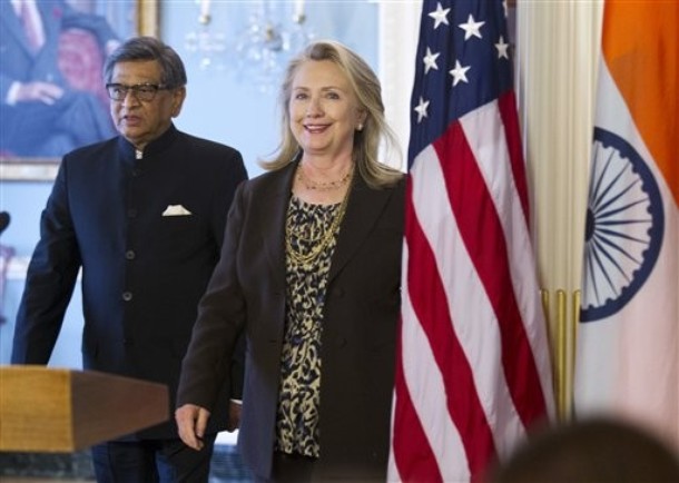 Secretary of State Hillary Rodham Clinton and Indian Foreign Minister S.M. Krishna walk to a joint news conference, Wednesday, June 13, 2012,  at the State Department in Washington.  (AP Photo/Manuel Balce Ceneta)
