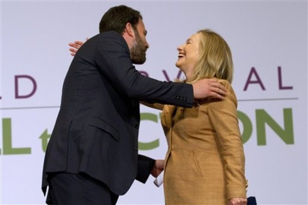 Secretary of State Hillary Rodham Clinton hugs actor Ben Affleck after speaking at the USAID Child Survival Forum, Thursday, June 14, 2012, at Georgetown University in Washington. (AP Photo/Jacquelyn Martin)