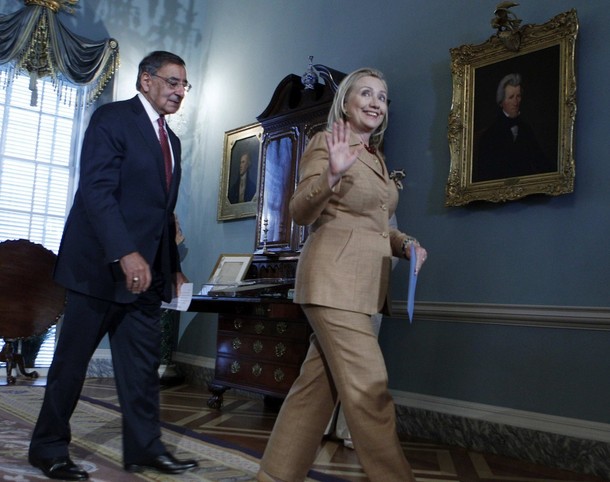 U.S. Secretary of State Hillary Clinton waves to the media as she leaves with Defense Secretary Leon Panetta after a news conference with South Korea's Minister of Foreign Affairs and Trade Kim Sung-hwan, and Minister of National Defense Kim Kwan-jin at the State Department in Washington June 14, 2012. REUTERS/Jose Luis Magana (UNITED STATESU.S. Secretary of State Hillary Clinton waves to the media as she leaves with Defense Secretary Leon Panetta after a news conference with South Korea's Minister of Foreign Affairs and Trade Kim Sung-hwan, and Minister of National Defense Kim Kwan-jin at the State Department in Washington June 14, 2012. REUTERS/Jose Luis Magana (UNITED STATES - Tags: POLITICS) - Tags: POLITICS)