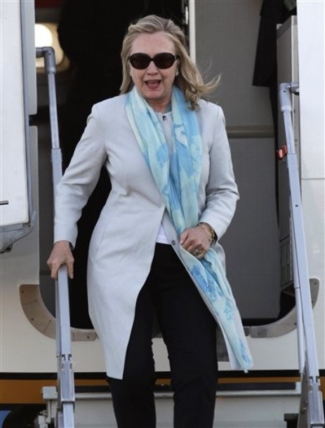 U.S. Secretary of State Hillary Clinton arrives to Los Cabos international airport to attend the G-20 Summit in Baja California Sur, Mexico, Sunday, June 17, 2012. (AP Photo/Eduardo Verdugo)