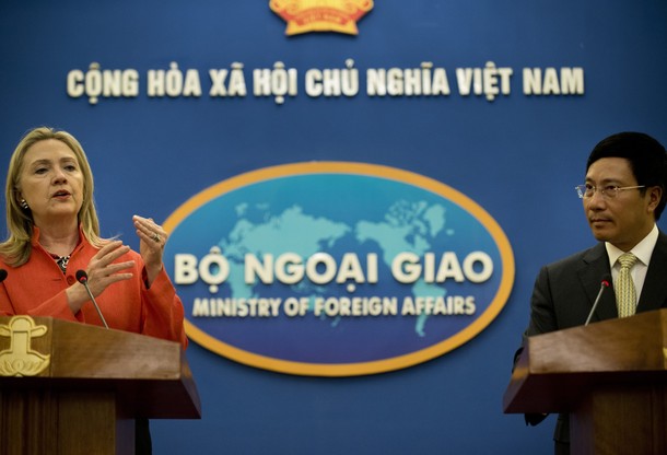 US Secretary of State Hillary Clinton (L) and Vietnamese Foreign Minister Pham Binh Minh attend a press conference at the Government Guest House in Hanoi on July 10, 2012.  Clinton is visiting Vietnam during a multiple stop tour of Asia where she is expected to meet with leaders and others to strengthen American economic and strategic interests.  AFP PHOTO/POOL/Brendan SMIALOWSKI        (Photo credit should read BRENDAN SMIALOWSKI/AFP/GettyImages)