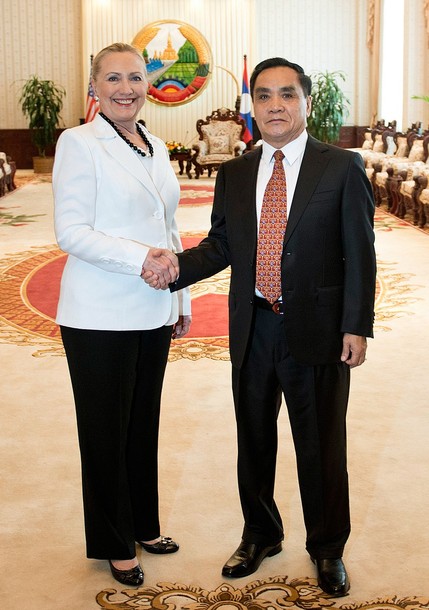 US Secretary of State Hillary Clinton (L) shakes hands with Laotian Prime Minister Thongsing Thammavong (R) at their meeting at the prime minister's office in Vientiane on July 11, 2012.  Clinton became the first US secretary of state to visit Laos for 57 years, on a trip focused on the damaging legacy of the Vietnam War and a controversial dam project.     AFP PHOTO / POOL / Brendan SMIALOWSKI        (Photo credit should read BRENDAN SMIALOWSKI/AFP/GettyImages)
