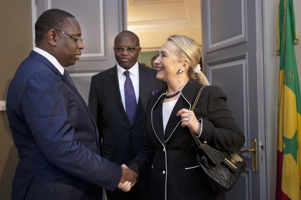 U.S. Secretary of State Hillary Clinton meets with Senegal's President Macky Sall at the Presidential Palace in Dakar