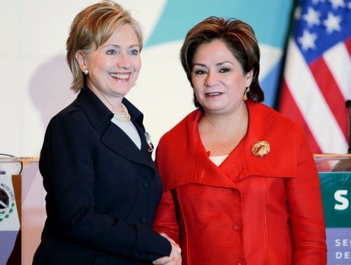 US Secretary of State Clinton shakes hands with Mexican Foreign Secretary Espinosa after a news conference in Mexico City