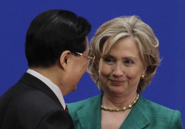 U.S. Secretary of State Hillary Clinton looks at China's President Hu Jintao during the opening ceremony of the China-U.S. Strategic and Economic Dialogue in Beijing
