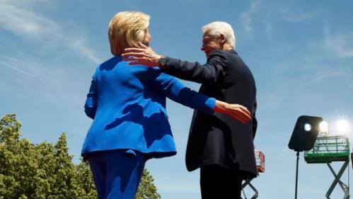 U.S. Democratic presidential candidate Hillary Clinton is joined onstage by her husband former President Bill Clinton after delivering her "official launch speech" at a campaign kick off rally in Franklin D. Roosevelt Four Freedoms Park on Roosevelt Island in New York City, June 13, 2015. REUTERS/Lucas Jackson