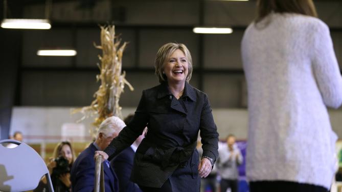 Democratic presidential candidate Hillary Rodham Clinton walks on stage before speaking at the Central Iowa Democrats Fall Barbecue Sunday, Nov. 15, 2015, in Ames, Iowa. (AP Photo/Charlie Neibergall)