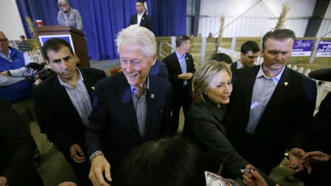 Former president Bill Clinton and his wife Democratic presidential candidate Hillary Rodham Clinton greet supporters at the Central Iowa Democrats Fall Barbecue Sunday, Nov. 15, 2015, in Ames, Iowa. (AP Photo/Charlie Neibergall)