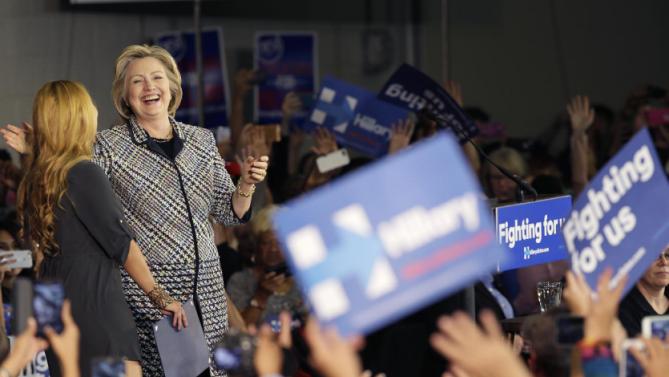 Democratic presidential candidate Hillary Rodham Clinton laughs after she was introduced at a campaign event at Mountain View Community College, Tuesday, Nov. 17, 2015, in Dallas. (AP Photo/LM Otero)