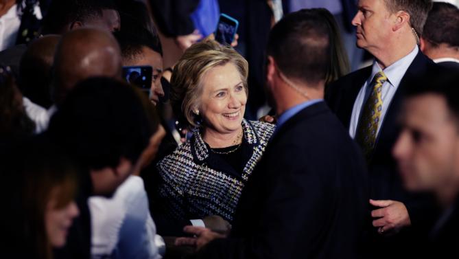 Democratic presidential candidate Hillary Rodham Clinton poses for photos with supporters after speaking at a campaign event at Mountain View Community College, Tuesday, Nov. 17, 2015, in Dallas. (AP Photo/LM Otero)