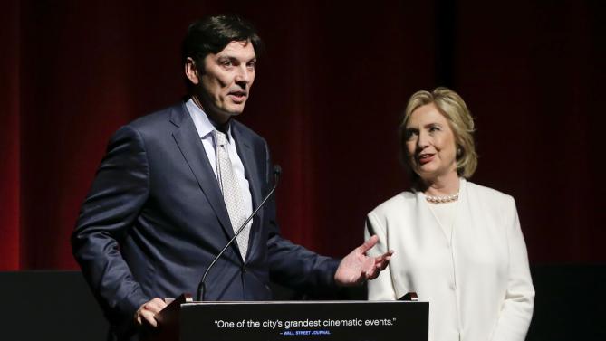 AOL CEO and chairman Tim Armstrong, left, introduces Democratic presidential candidate Hillary Rodham Clinton before the premiere of the movie "Makers: Once and for All", Thursday, Nov. 19, 2015, in New York. The movie chronicles the months in 1995 leading up to the U.N. Fourth World Conference on Women in Beijing which Clinton attended. (AP Photo/Julie Jacobson)