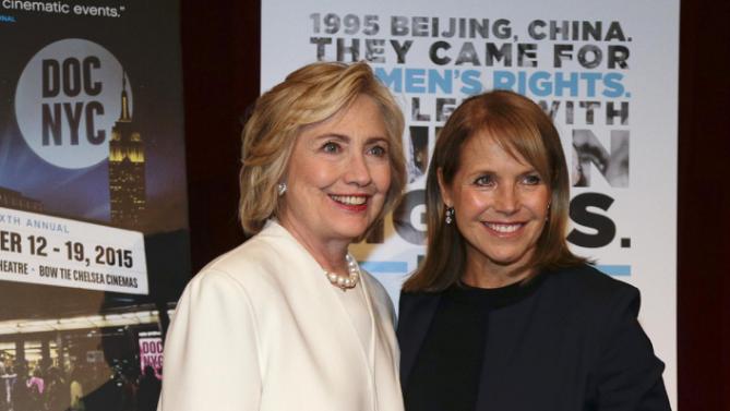 Democratic presidential candidate Hillary Rodham Clinton, left, poses for a photo with Katie Couric before the premiere of the movie "Makers: Once and for All," Thursday, Nov. 19, 2015, in New York. The movie chronicles the months in 1995 leading up to the U.N. Fourth World Conference on Women in Beijing which Clinton attended. (AP Photo/Julie Jacobson)