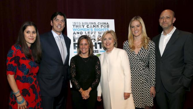 Democratic U.S. presidential candidate Hillary Clinton (C) poses for photographers with (from L) producer Sarah Wolitzky, AOL CEO Tim Armstrong, director Dyllan McGee, producer Samantha Leibovitz and director Michael Epstein at the premiere of the documentary film "Makers: Once And For All" at the DOC NYC documentary film festival in the Manhattan borough of New York City, November 19, 2015. "Makers: Once And For All" tells the story of the 1995 Beijing Women's Conference and features commentary from the former U.S. First Lady and Secretary of State. REUTERS/Mike Segar