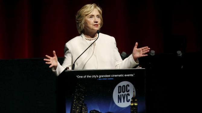 Democratic U.S. presidential candidate Hillary Clinton makes remarks on stage before the premiere of the documentary film "Makers: Once And For All" at the DOC NYC documentary film festival in the Manhattan borough of New York City, November 19, 2015. "Makers: Once And For All" tells the story of the 1995 Beijing Women's Conference and features commentary from the former U.S. First Lady and Secretary of State. REUTERS/Mike Segar
