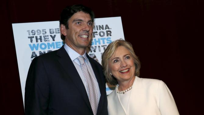 Democratic U.S. presidential candidate Hillary Clinton poses with AOL CEO Tim Armstrong as she arrives for the premiere of the documentary film "Makers: Once And For All" at the DOC NYC documentary film festival in the Manhattan borough of New York City, November 19, 2015. "Makers: Once And For All" tells the story of the 1995 Beijing Women's Conference and features commentary from the former U.S. First Lady and Secretary of State. REUTERS/Mike Segar
