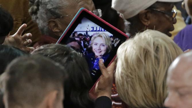 A woman takes a selfie with Democratic presidential candidate Hillary Rodham Clinton after Clinton spoke at Fisk University Friday, Nov. 20, 2015, in Nashville, Tenn. (AP Photo/Mark Humphrey)