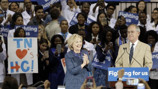Democratic presidential candidate Hillary Rodham Clinton is introduced by Rep. Jim Cooper, D-Tenn., at Fisk University Friday, Nov. 20, 2015, in Nashville, Tenn. (AP Photo/Mark Humphrey)