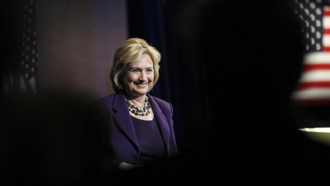 Democratic presidential candidate Hillary Clinton smiles at the at New Hampshire Democrats party's annual dinner in Manchester, N.H., Sunday, Nov. 29, 2015. (AP Photo/Cheryl Senter)
