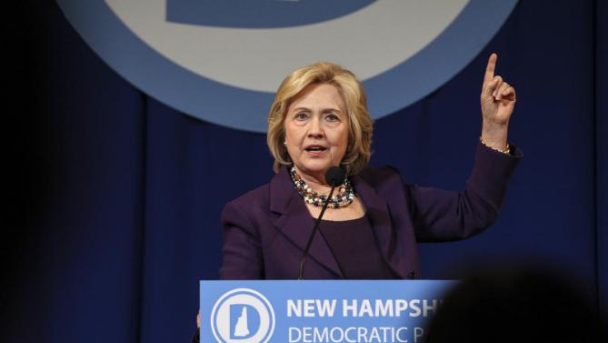 Democratic presidential candidate Hillary Clinton gestures while speaking at the at New Hampshire Democrats party's annual dinner in Manchester, N.H., Sunday, Nov. 29, 2015. (AP Photo/Cheryl Senter)