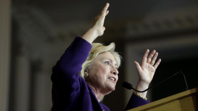Democratic presidential candidate Hillary Clinton addresses an audience at a rally at Faneuil Hall, Sunday, Nov. 29, 2015, in Boston. The event was held to launch “Hard Hats for Hillary," a coalition created to organize people in industries and labor to support Clinton's agenda. (AP Photo/Steven Senne)