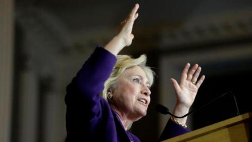 Democratic presidential candidate Hillary Clinton addresses an audience at a rally at Faneuil Hall, Sunday, Nov. 29, 2015, in Boston. The event was held to launch Hard Hats for Hillary," a coalition created to organize people in industries and labor to support Clinton's agenda. (AP Photo/Steven Senne)