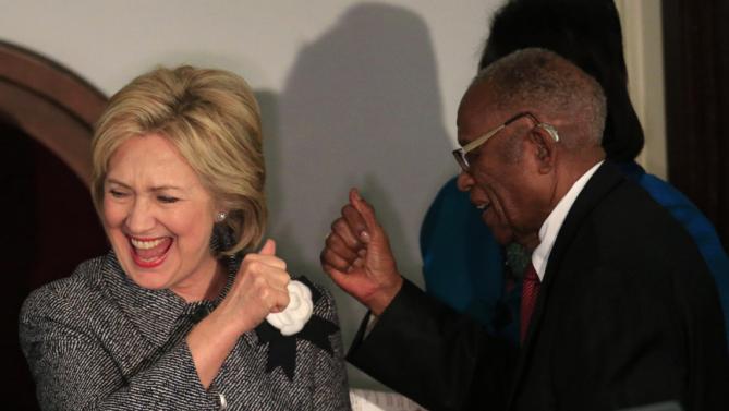 U.S. Democratic presidential candidate Hillary Clinton is greeted by Fred D. Gray, attorney for the late civil rights icon Rosa Parks, at the Dexter Avenue Baptist church during the National Bar Association's 60th anniversary of the Montgomery Bus Boycott  in Montgomery, Alabama December 1, 2015. REUTERS/Marvin Gentry TPX IMAGES OF THE DAY