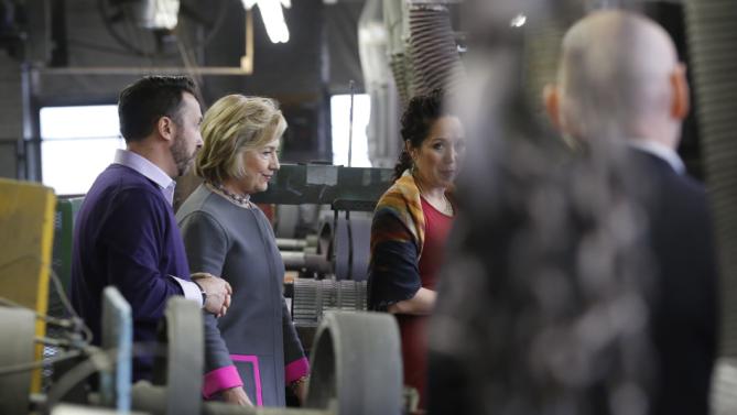 Democratic presidential candidate Hillary Clinton tours WH Bagshaw, a 5th generation family owned business Thursday, Dec. 3, 2015, in Nashua, N.H. (AP Photo/Jim Cole)