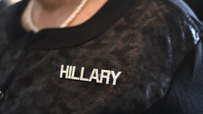 Supporter Elaine Dodd shows off her custom Hillary pin at a rally for U.S. Democratic presidential candidate Hillary Clinton in Tulsa, Oklahoma December 11, 2015. REUTERS/Nick Oxford