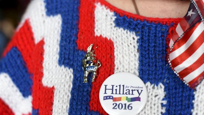 Volunteer Diane Helt wears her hand knitted patriotic sweater and custom donkey pin at a campaign rally for U.S. Democratic presidential candidate Hillary Clinton in Tulsa, Oklahoma December 11, 2015. REUTERS/Nick Oxford