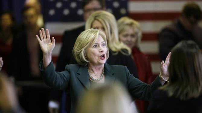 Democratic presidential candidate Hillary Clinton reacts to supporters during a town hall meeting Wednesday, Dec. 16, 2015, in Mason City, Iowa. (AP Photo/Charlie Neibergall)