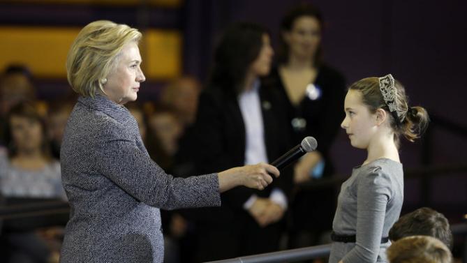 Democratic presidential candidate Hillary Clinton listens to a question from fifth-grader Hannah Tandy during a town hall meeting at Keota High School, Tuesday, Dec. 22, 2015, in Keota, Iowa. (AP Photo/Charlie Neibergall)