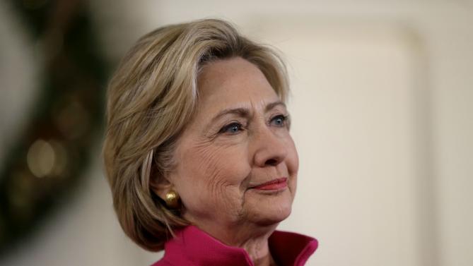 Democratic presidential candidate Hillary Clinton listens during a town hall style campaign event Tuesday, Dec. 29, 2015, at South Church, in Portsmouth, N.H. (AP Photo/Steven Senne)