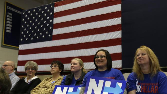 Supporters of Democratic presidential candidate Hillary Clinton wait for the start of a town hall style campaign event Sunday, Jan. 3, 2016, in Derry, N.H. (AP Photo/Steven Senne)