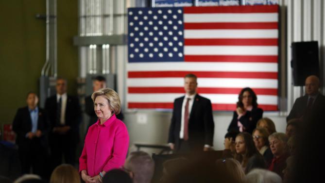 Democratic presidential candidate Hillary Clinton waits to be introduced before speaking at a town hall at NewBo City Market in Cedar Rapids, Iowa, Monday, Jan. 4, 2016. (AP Photo/Patrick Semansky)
