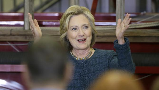 Democratic presidential candidate Hillary Clinton reacts to supporters during a campaign stop at the Osage Public Safety Center, Tuesday, Jan. 5, 2016, in Osage, Iowa. (AP Photo/Charlie Neibergall)