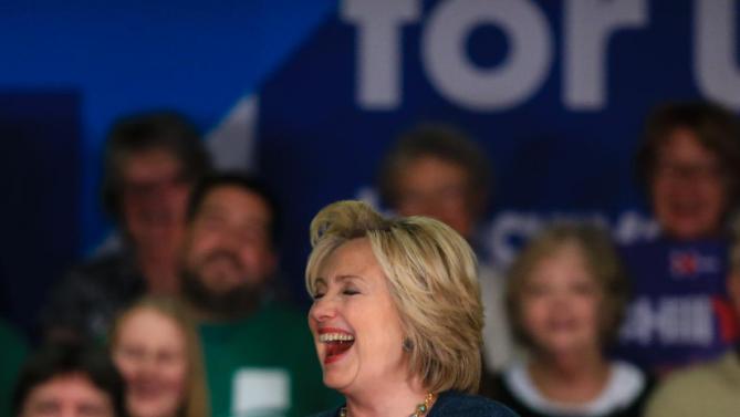Democratic presidential candidate Hillary Clinton laughs during a campaign stop at Iowa Western Community College in Council Bluffs, Iowa, Tuesday, Jan. 5, 2016. (AP Photo/Nati Harnik)