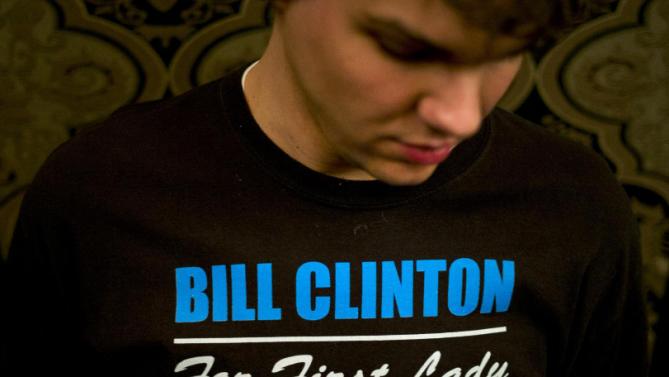 Jason Winter wears a sweatshirt to show his support for Democratic presidential candidate Hillary Clinton at a rally at the Orpheum Theatre, Tuesday, Jan. 5, 2016, in Sioux City, Iowa. (AP Photo/Jae C. Hong)
