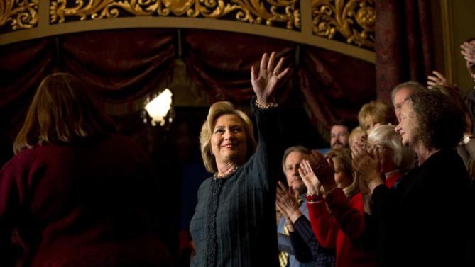 Democratic presidential candidate Hillary Clinton, center, is introduced at a rally held at the Orpheum Theatre, Tuesday, Jan. 5, 2016, in Sioux City, Iowa. (AP Photo/Jae C. Hong)